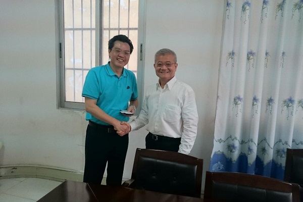 泰国纳勒宣大学陈柱江博士与鸭脖国教院蒋基昌院长