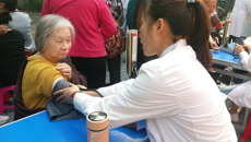 壮医药学院14级团支部开展“关爱居民 健康同行”志愿服务活动