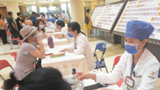 国壮举办“为民办实事——壮医惠民八桂行”大型义诊活动