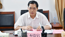 自治区副主席李常官到YABO鸭脖调研