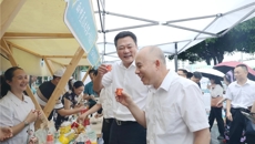 一附院参加广西中医药文化服务月暨中医药文化市集活动周启动仪式